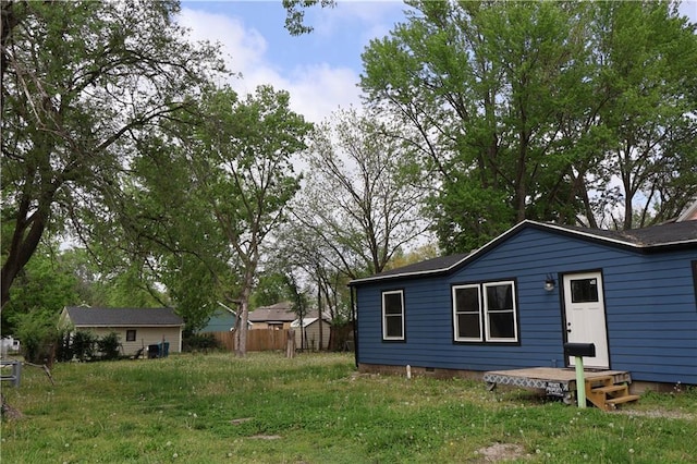 738 Pacific Ave, Osawatomie, KS 66064 - rear view of property with fence