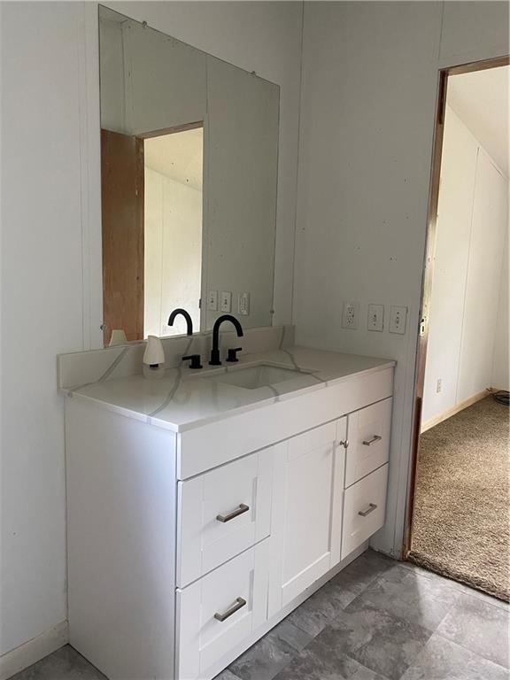 738 Pacific Ave, Osawatomie, KS 66064 - bathroom featuring vanity