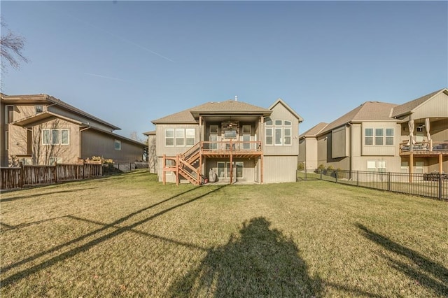 back of house with a lawn