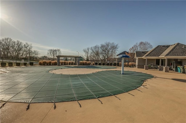 view of pool featuring a pergola and a patio