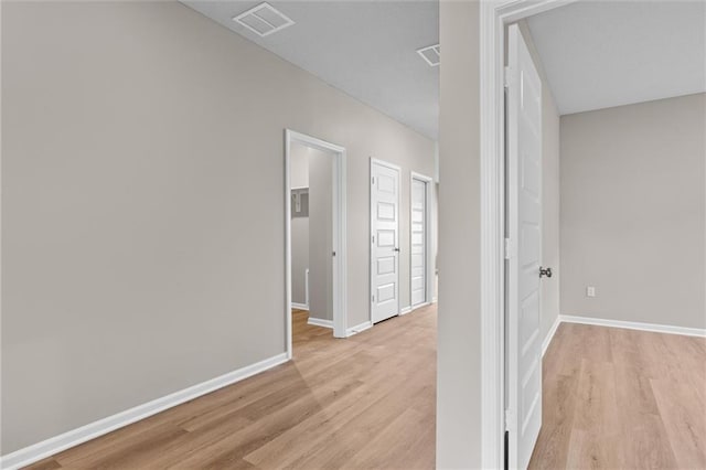 hall featuring light wood-type flooring