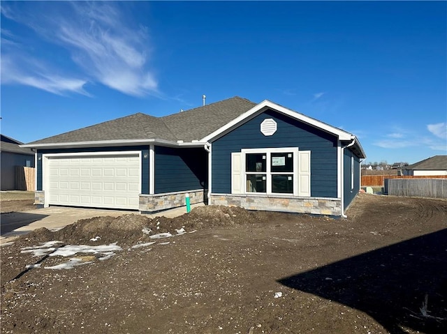 ranch-style house with a garage