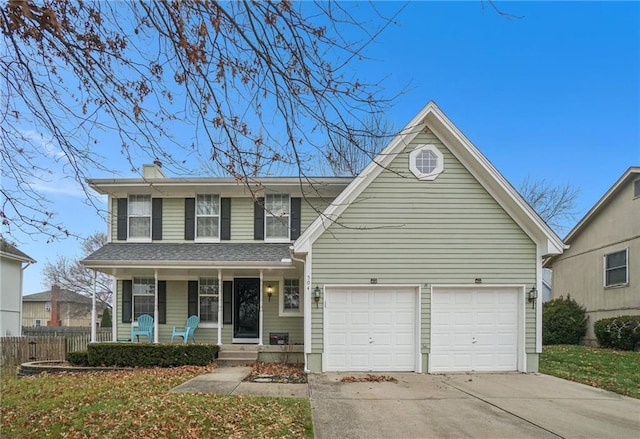 front facade with covered porch, a garage, and a front lawn