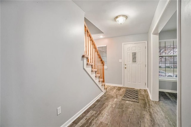 entrance foyer with hardwood / wood-style floors