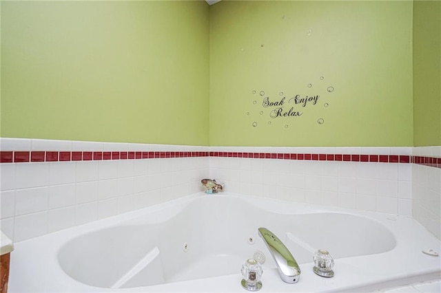 bathroom featuring a relaxing tiled tub