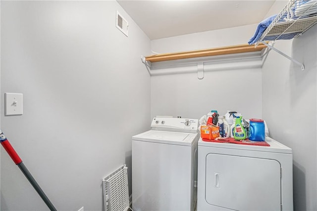 clothes washing area featuring washing machine and dryer