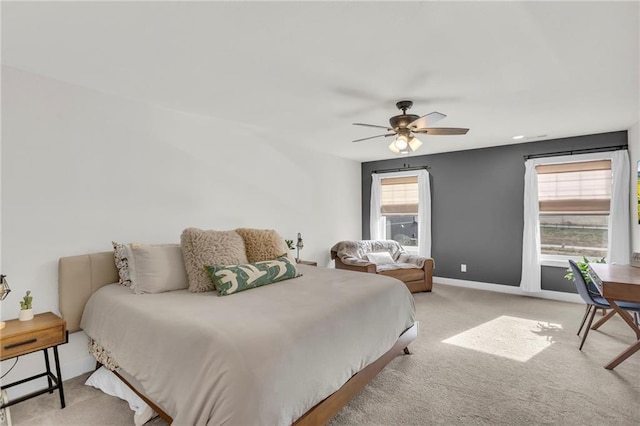 carpeted bedroom with ceiling fan