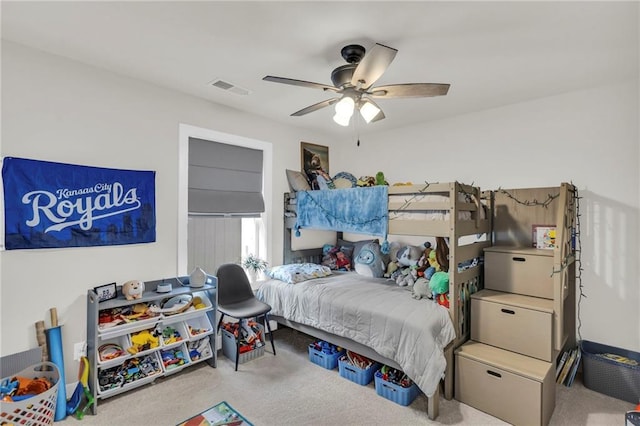 carpeted bedroom with ceiling fan