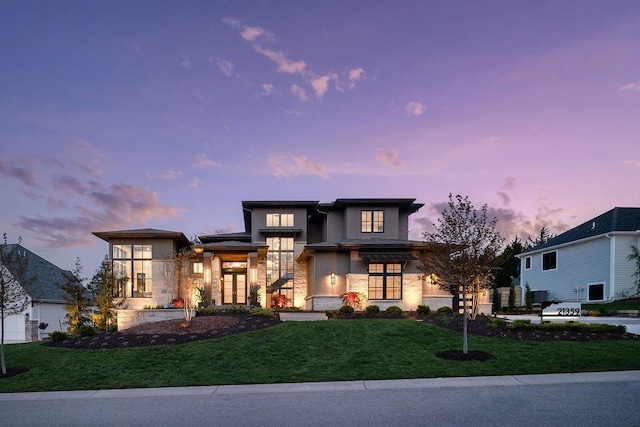 21359 W 93rd Ct, Lenexa, KS 66220 - view of front facade with stucco siding, a front lawn, and stone siding