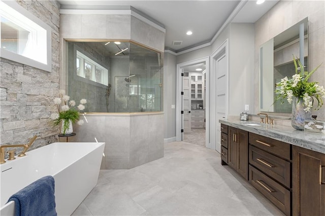 21359 W 93rd Ct, Lenexa, KS 66220 - bathroom featuring a walk in shower, vanity, a freestanding bath, and recessed lighting