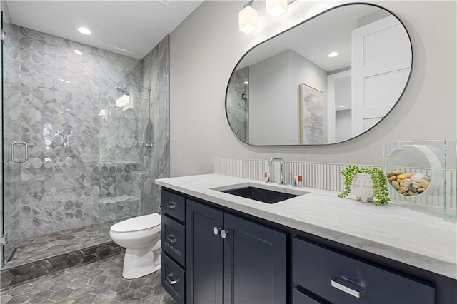 21359 W 93rd Ct, Lenexa, KS 66220 - bathroom featuring toilet, a shower stall, vanity, and recessed lighting