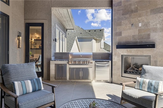 21359 W 93rd Ct, Lenexa, KS 66220 - view of patio featuring a fireplace
