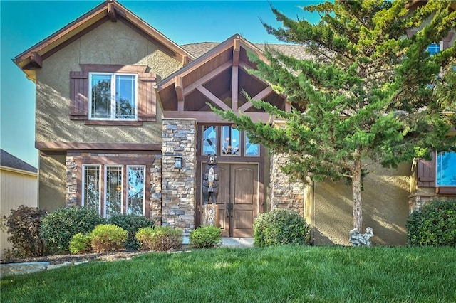 view of front of home with a front lawn