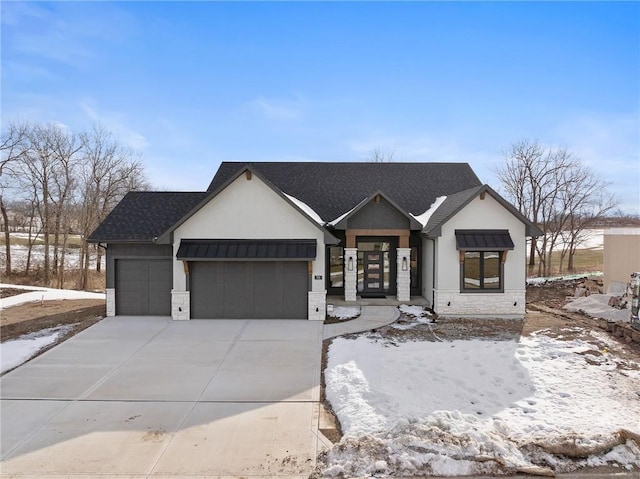 view of front of house with a garage