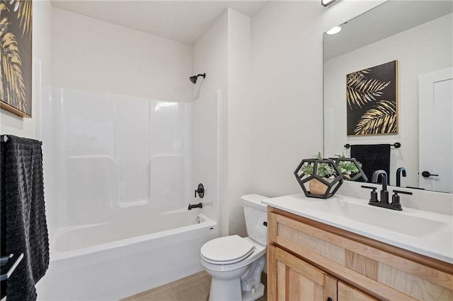 full bathroom with toilet, vanity, tile patterned flooring, and  shower combination