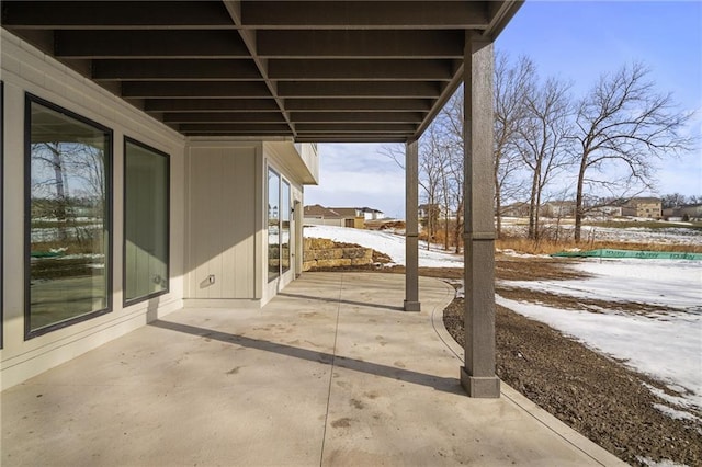 view of snow covered patio