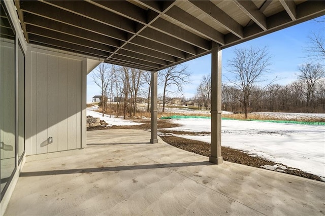 view of snow covered patio