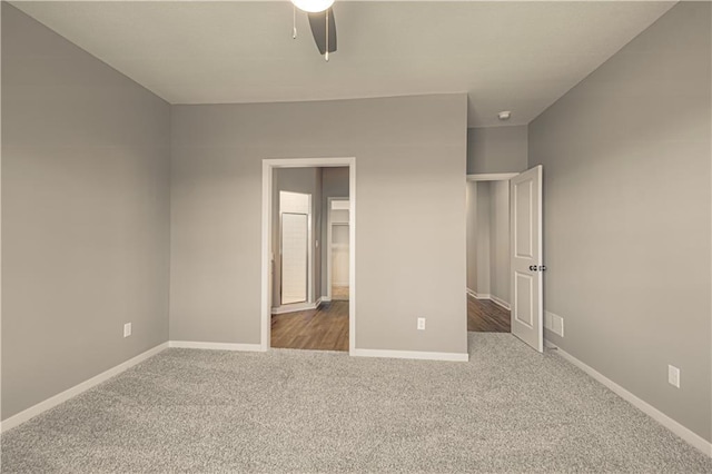 unfurnished bedroom featuring carpet floors and ceiling fan