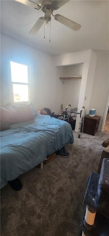 bedroom featuring ceiling fan and carpet floors