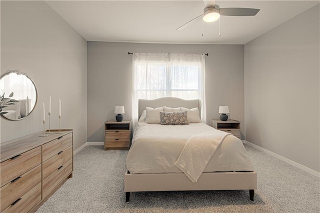 bedroom featuring ceiling fan and light colored carpet