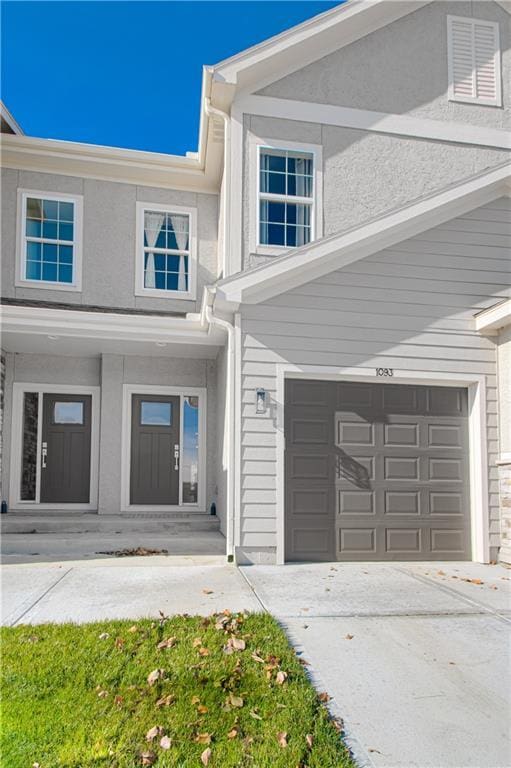 property entrance with a garage