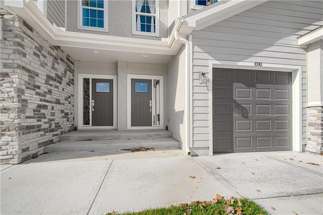 property entrance featuring a garage