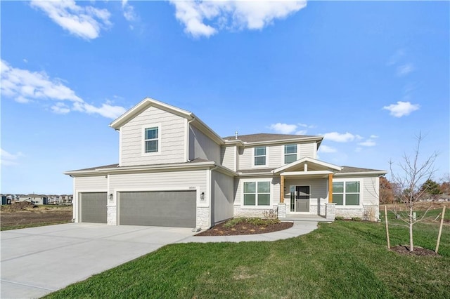 18580 W 169th Ter, Olathe, KS 66062 - view of front facade featuring stone siding, an attached garage, a front lawn, and driveway