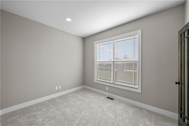 18580 W 169th Ter, Olathe, KS 66062 - unfurnished room featuring light colored carpet and recessed lighting
