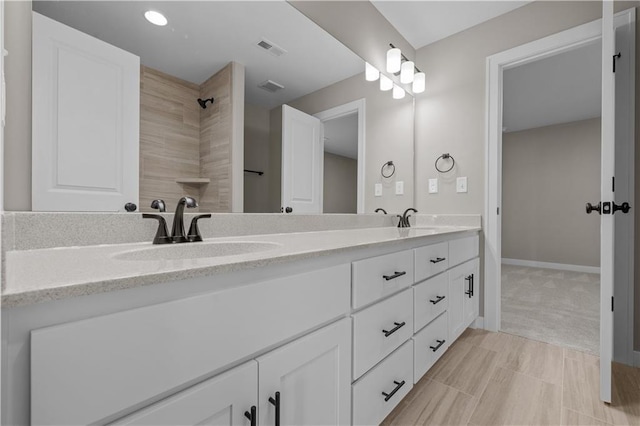 18580 W 169th Ter, Olathe, KS 66062 - full bathroom featuring double vanity and baseboards