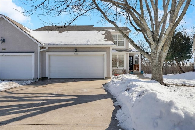 view of front of home with a garage