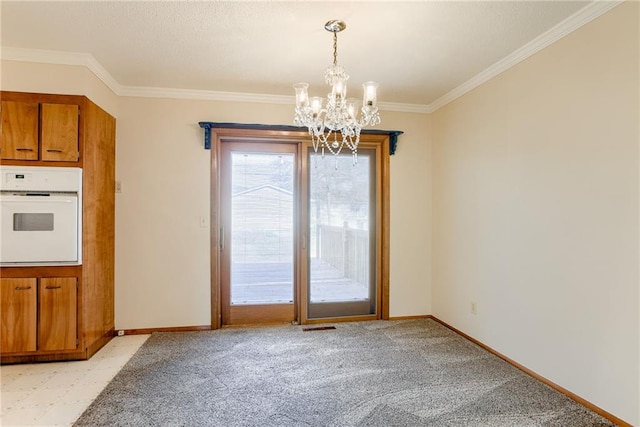 5032 NE 57th Ter, Kansas City, MO 64119 - unfurnished dining area with a chandelier, ornamental molding, and baseboards
