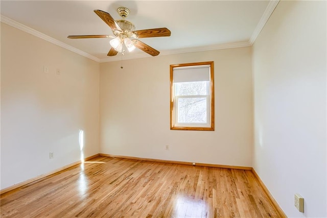 5032 NE 57th Ter, Kansas City, MO 64119 - empty room featuring wood finished floors, baseboards, crown molding, and ceiling fan