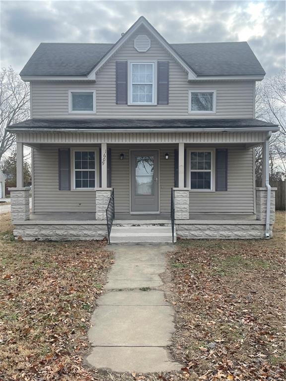 view of front of property featuring covered porch