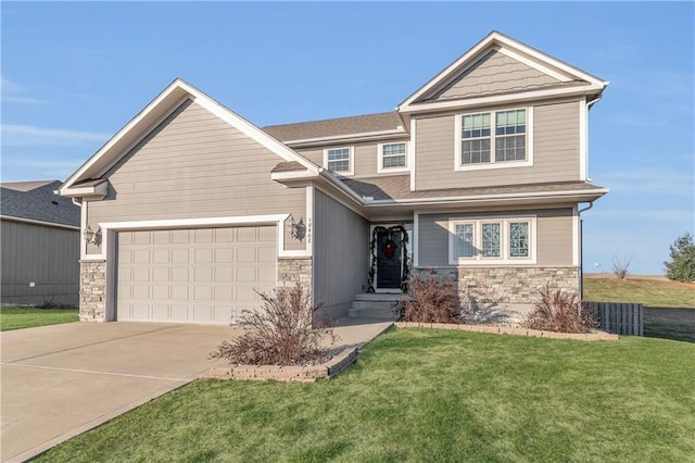 craftsman-style home with a garage and a front lawn