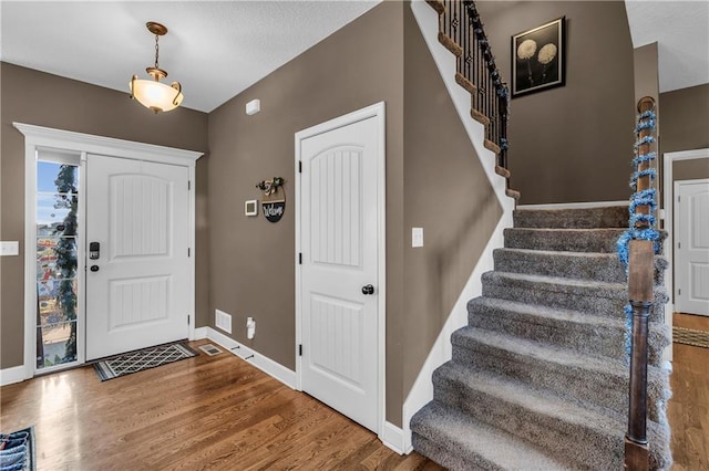 entrance foyer with hardwood / wood-style flooring