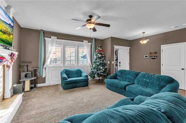 living room with carpet flooring and ceiling fan