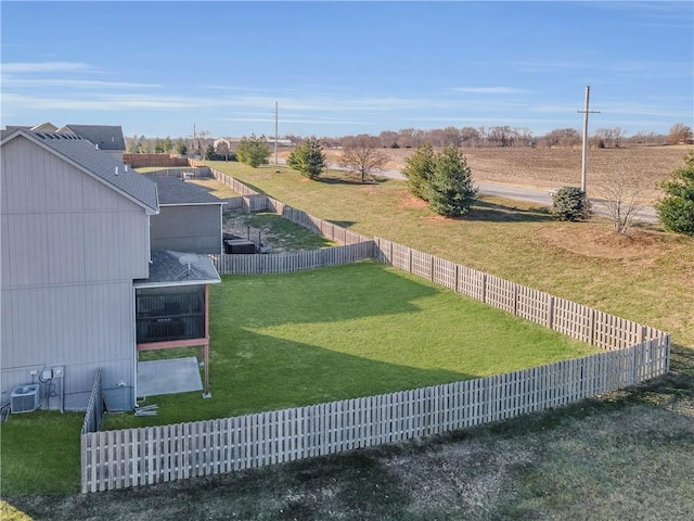 view of yard with a rural view