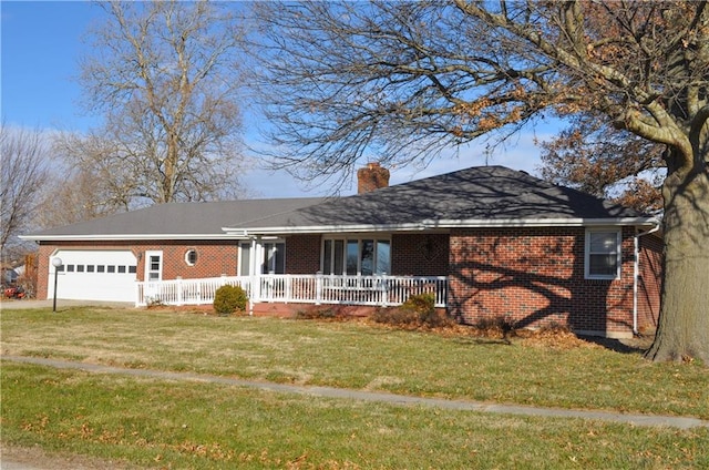 ranch-style house with a garage and a front yard