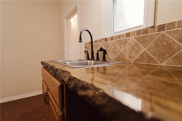 details with decorative backsplash and sink