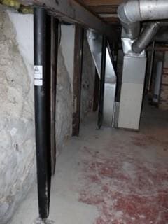 basement featuring heating unit