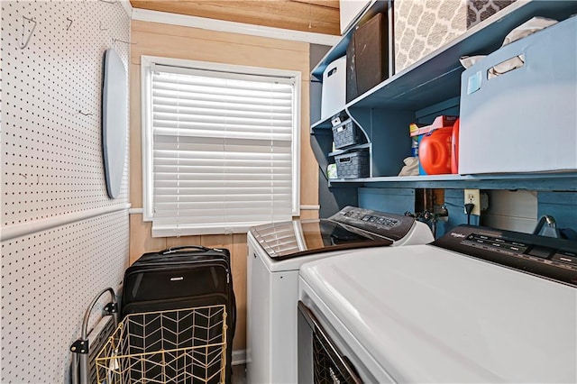 laundry area with washing machine and clothes dryer