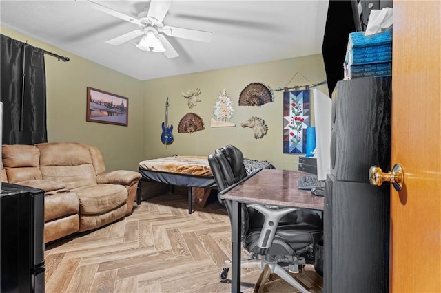 office with ceiling fan and light parquet floors