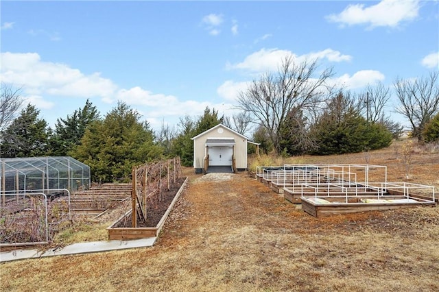 view of yard with an outbuilding and a rural view