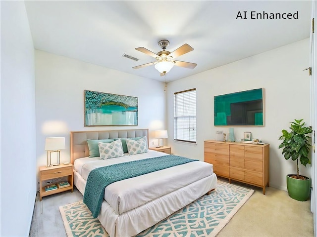 bedroom with ceiling fan and carpet flooring