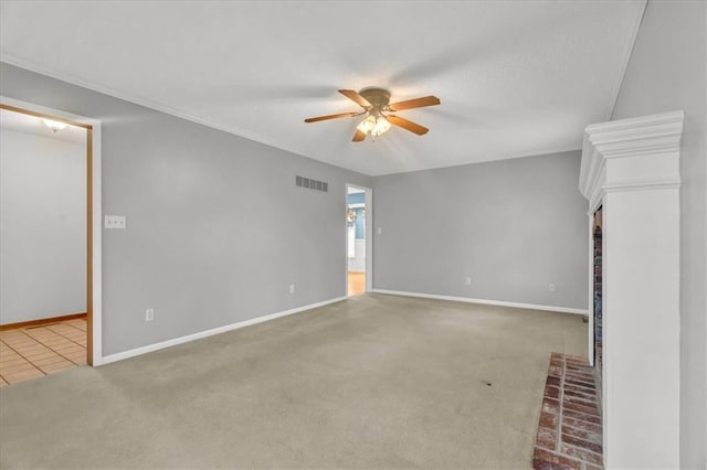 unfurnished living room with carpet and ceiling fan