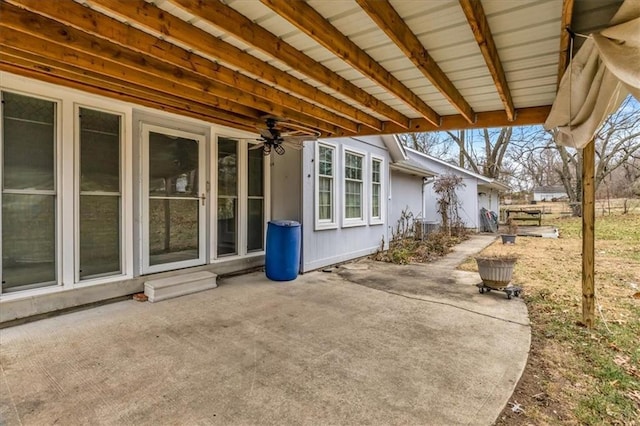 view of patio featuring ceiling fan