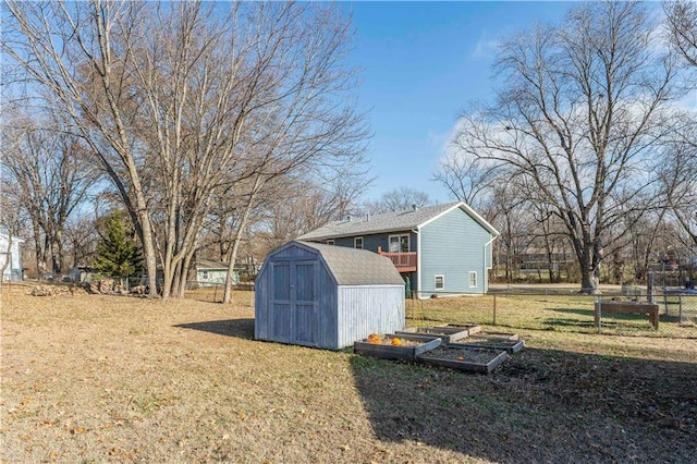 view of outbuilding featuring a yard