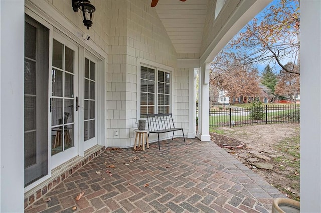 view of patio / terrace featuring french doors and ceiling fan