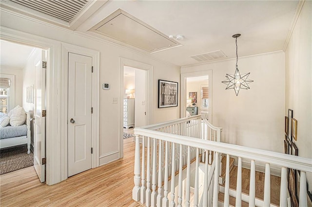 corridor featuring light hardwood / wood-style floors