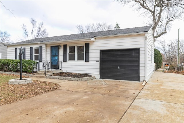 ranch-style house featuring a garage